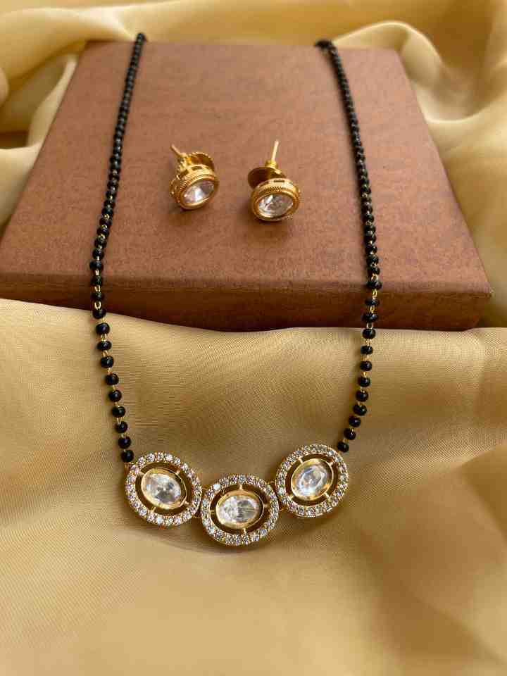 150+ Latest Daily Wear Diamond Mangalsutra Designs For Today's Brides |  Black beads mangalsutra design, Black beaded jewelry, Gold earrings designs