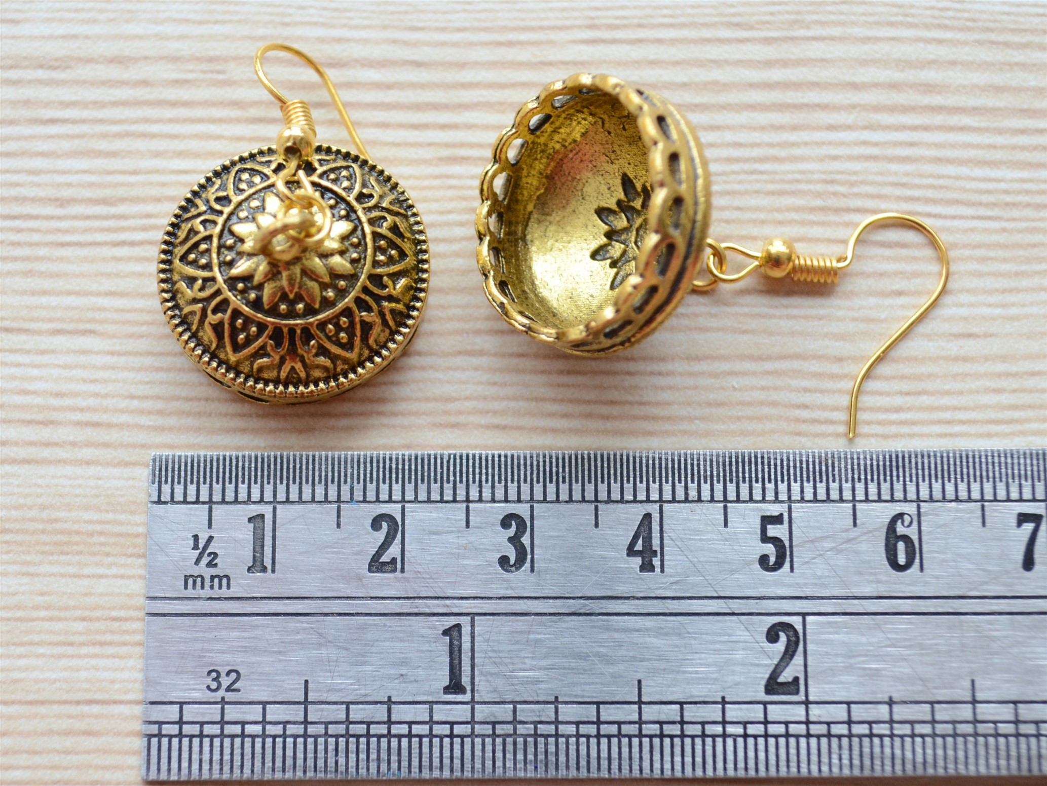 Traditional Designed Antique Hanging earrings studded with Ruby Green  synthetic stones, with… | Antique gold earrings, Jewelry design earrings, Gold  earrings indian